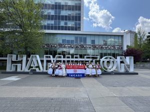 Klub Stepinac with their flag in front of the large HAMILTON letters outside City Hall.