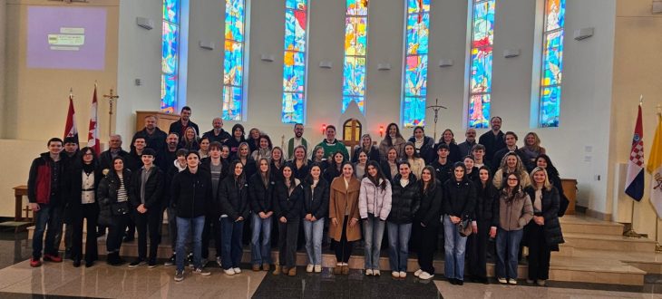 Klub Stepinac members, parents and friars gathered for a group photo in the Queen of Peace church in Norval after Sunday Mass.